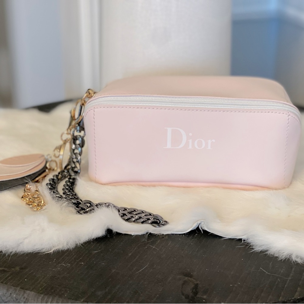 Dior light pink with white star “CD” zip & white Dior imprint & added keychain
